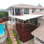 Home with Deck and Pool | Do I need a Professional Builder to Renovate