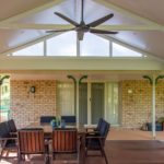 Warner Deck Extension Undercover Deck with Ceiling Fan and Table with Chairs