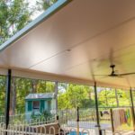 Warner deck extension view of ceiling fan and shed in the background