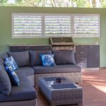 Warner deck extension view of day bed and BBQ in the background