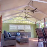 Warner deck extension view of daybed with ceiling fans