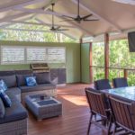 Warner deck extension view of undercover area showing day bed and bbw as well as table with chairs