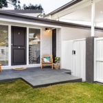 Stafford Renovation Rear of House with Trimmed Lawn