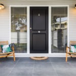 Stafford Build Property Door with Modern Lighting and Outdoor Furniture