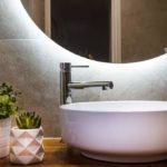 Bathroom renovations Brisbane wide with Turul - Bathroom Builders Brisbane homeowners love and trust: A modern vanity with an elegant hand basin and a round mirror