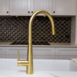 Rustic Queenslander kitchen sink faucet